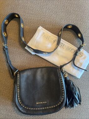 Michael Kors Black Leather Crossbody with Gold Accents and Tassel